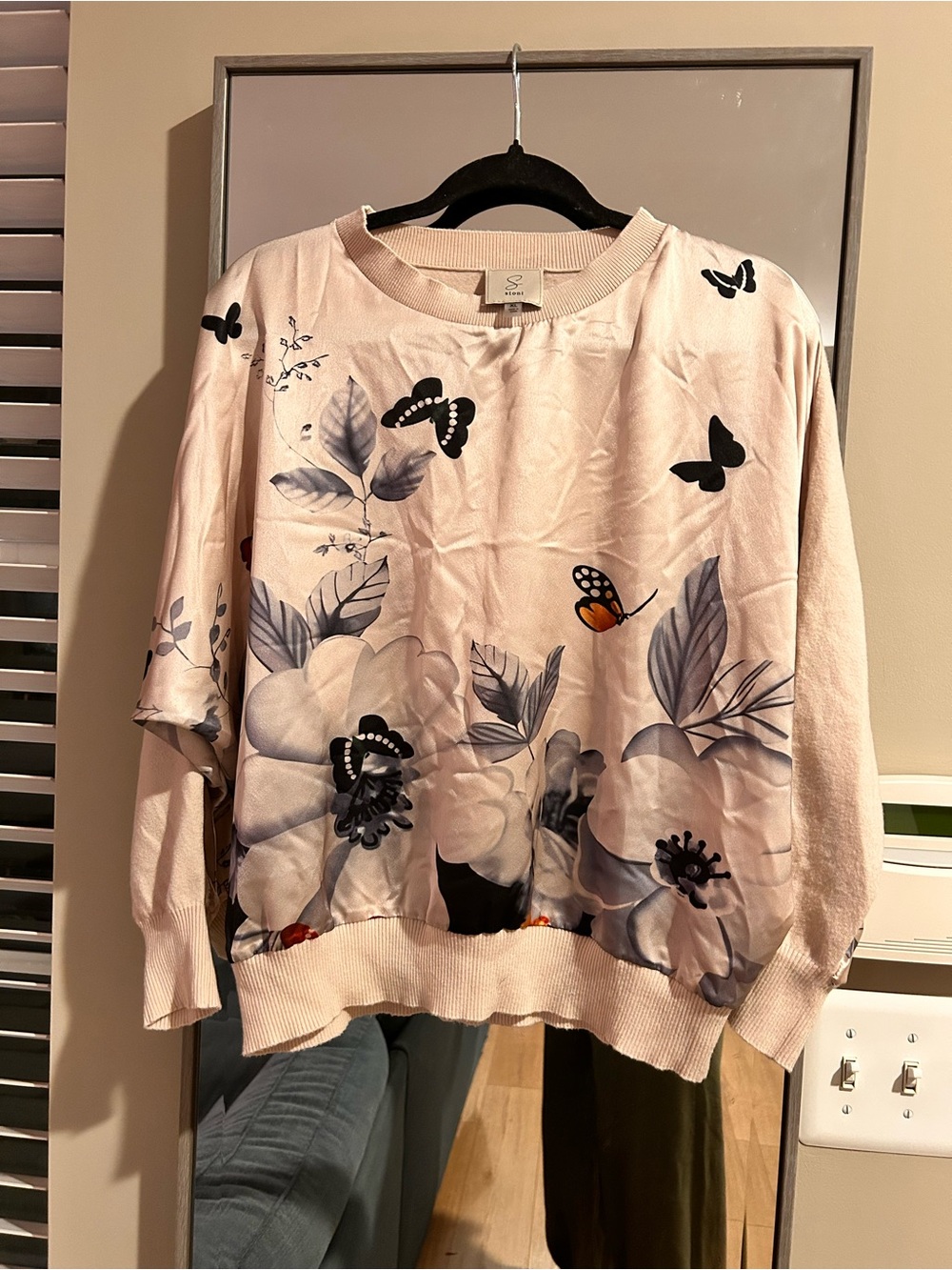Sioni cream colored top with delicate satin front panel with butterfly print